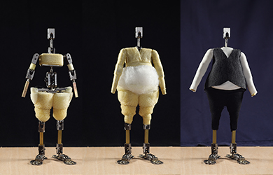 Three stages in skinning the stop motion puppet from inner skinning on the left to textile exterior on the right